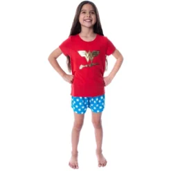 DC Comics Girls' Wonder Woman Gold Foil Logo Shirt And Shorts Pajama Set WW Logo -Kids Clothing Store GUEST 3c8707fd 9534 4e44 9757 cd8e53ba62cd